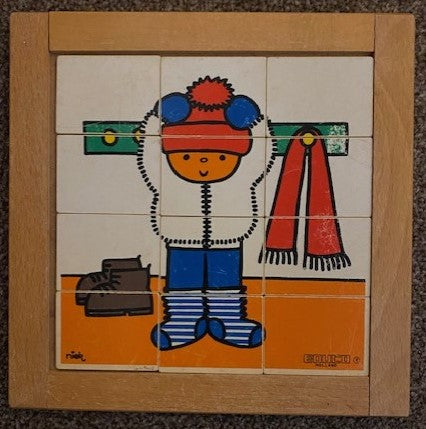 Educo Puzzel Kind met muts op (12 stukjes)