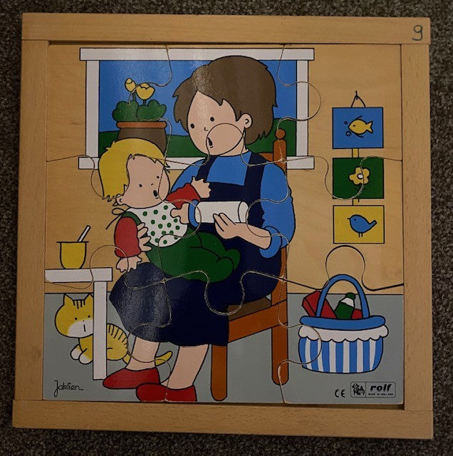 Rolf Puzzel Baby krijgt de fles (9 stukjes)